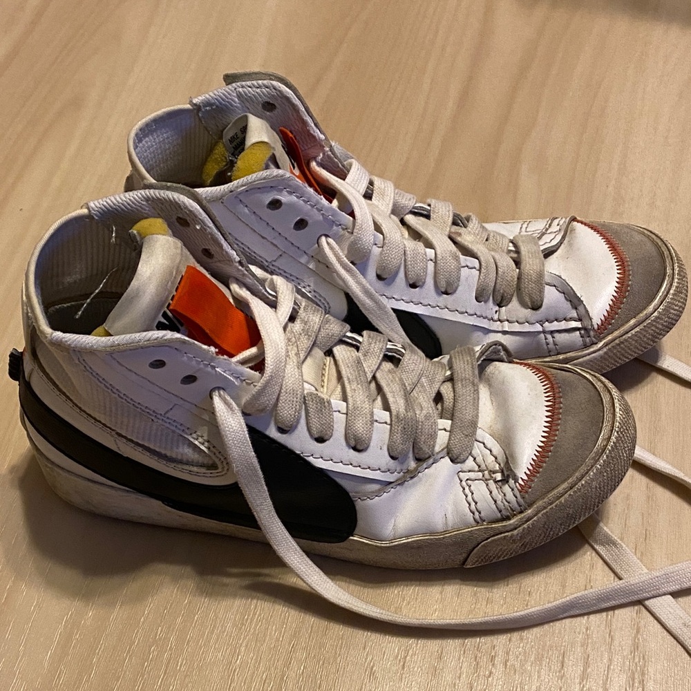 Nike White and Black High-Top Sneakers with Orange Tongue Accents